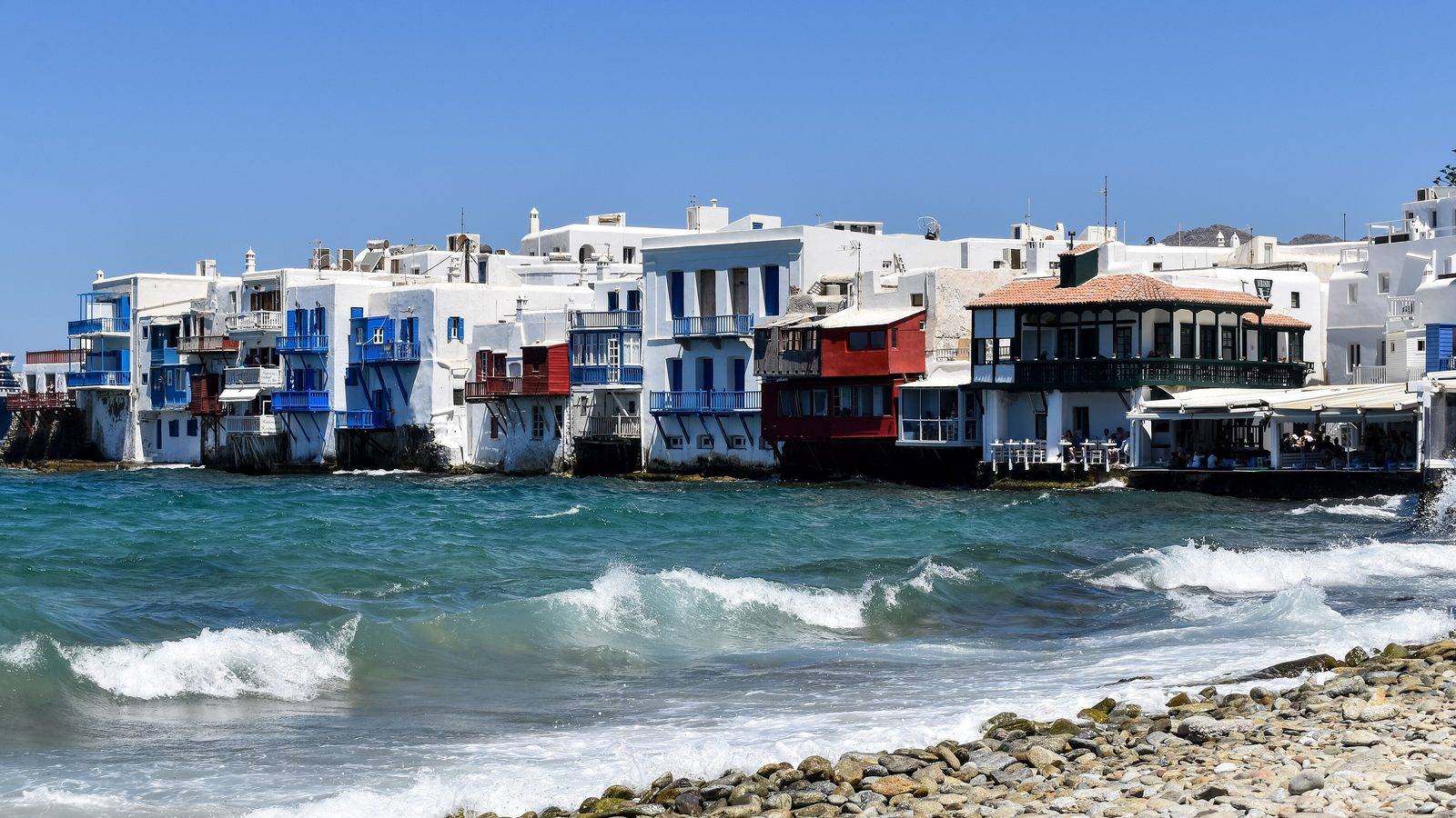 The whitewashed houses and painted balconies of Little Venice over the sea in Mykonos Town